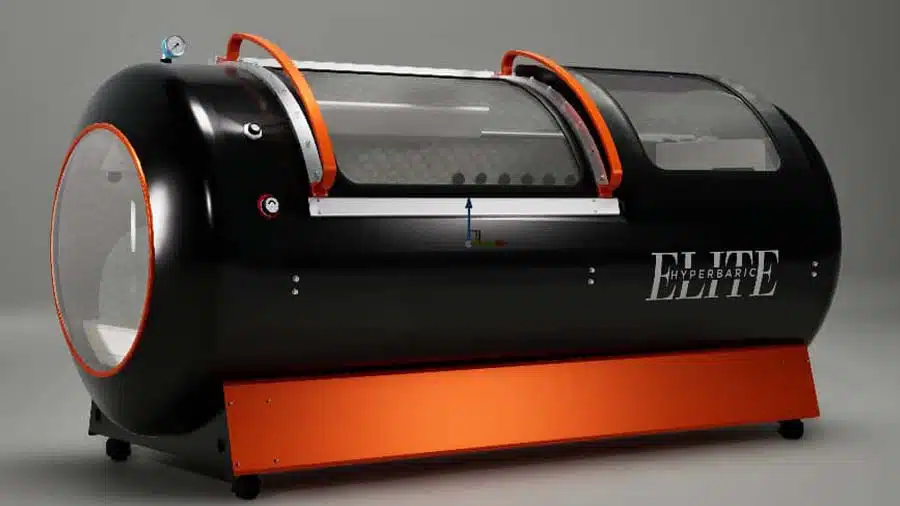 Black Elite Ultra 2 hyperbaric chamber with orange accent trim
